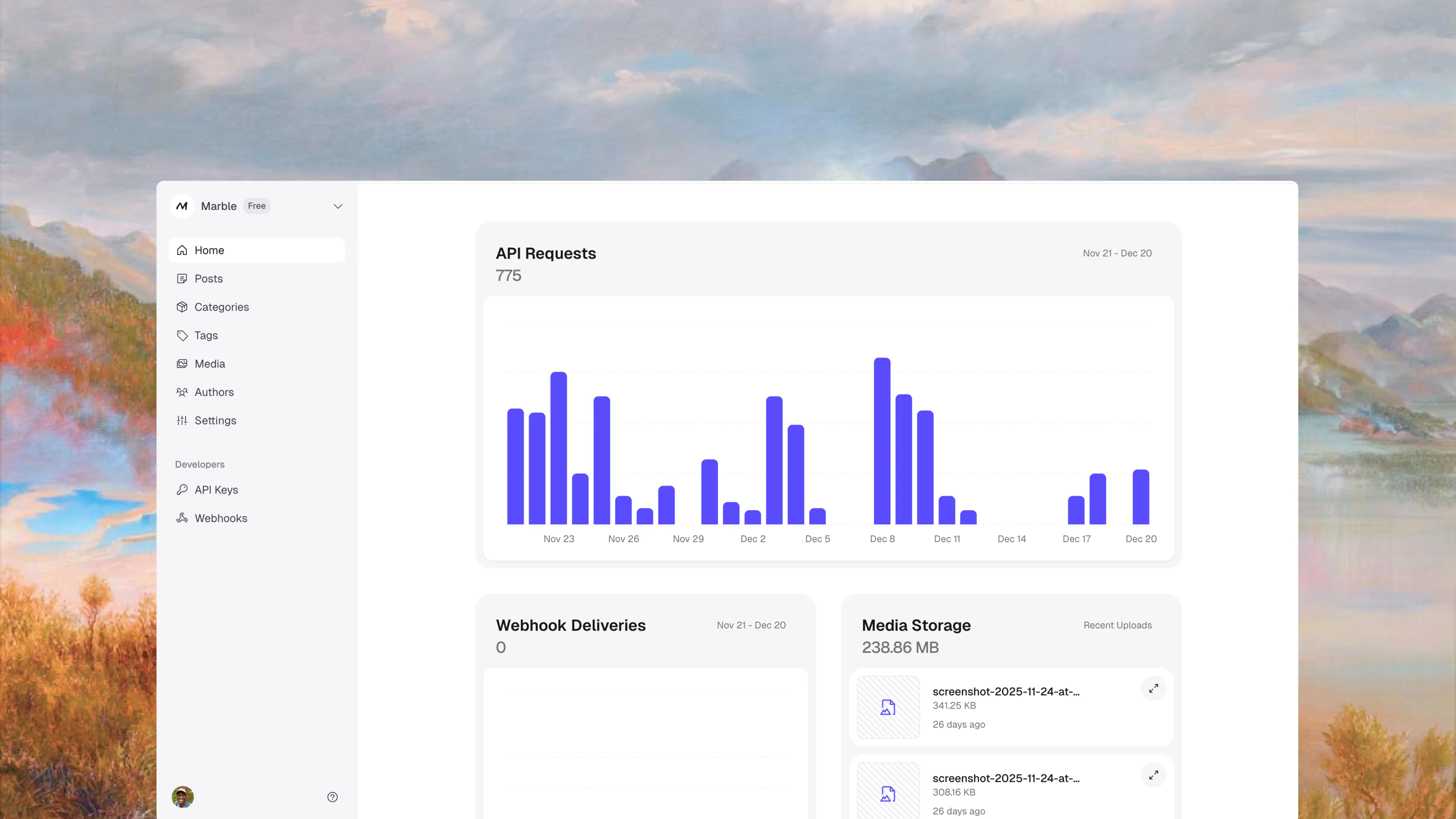 Marble dashboard with workspace analytics and recently uploaded media